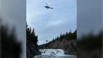 A man is removed from Bow Falls by helicopter after he sustained serious injuries from a fall. (Source: Banff Fire Department) 