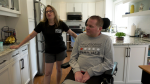 ALS patient Matthew Brown (right) is pictured with his wife Cathy Brown in their London home on May 15, 2024. (Bryan Bicknell/CTV News London) 
