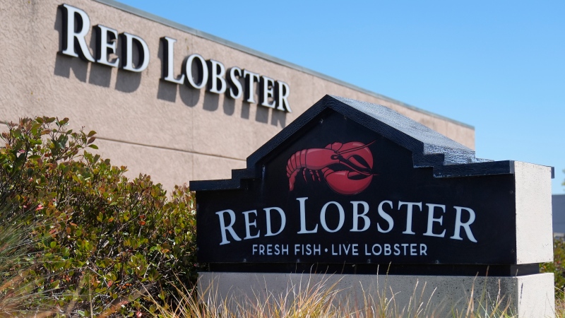 Signs to a Red Lobster restaurant are shown in San Bruno, Calif., Tuesday, May 14, 2024. (Jeff Chiu / AP Photo)
