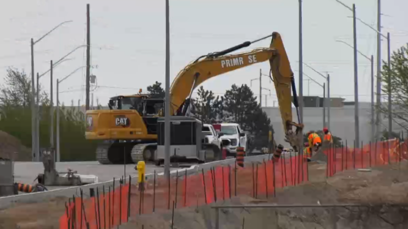 Construction crews at work on the new Bryne Drive extension at Harvie Road in Barrie, Ont. (CTV News/Chris Garry)