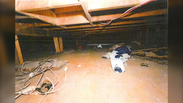 A photo entered in to evidence showing the crawl space where the child was held during her disappearance. (Source: Court filing)
