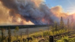 Homes damaged by wildfire near Fort Nelson 