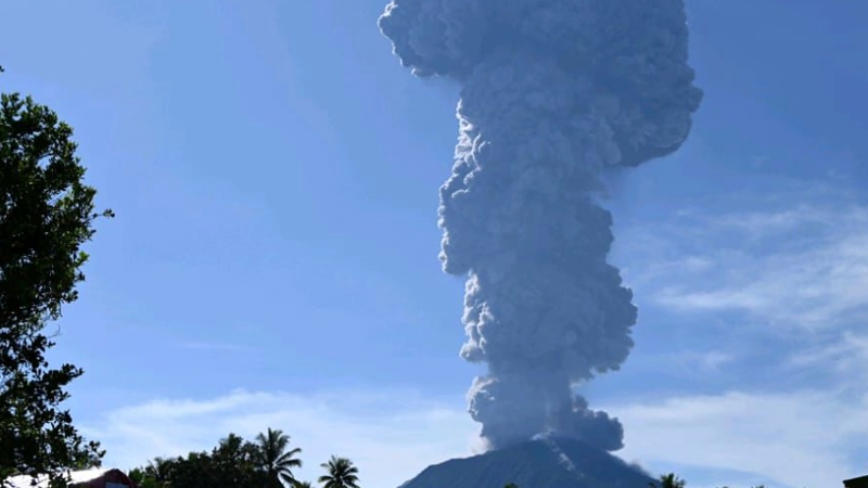 In this photo released by the Vulcanology and Geological Disaster Mitigation Center of the Indonesian Ministry of Energy and Mineral Resources (PVMBG-ESDM), Mount Ibu spews volcanic materials into the air during an eruption in West Halmahera, Indonesia, Monday, May 13, 2024. (PVMBG-ESDM via AP)