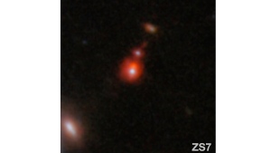 The ZS7 galaxy system reveals the most distant detection ever made of merging black holes. (ESA / Webb, NASA via AP)