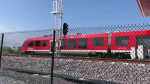 A train departs a station along the Trillium Line on Thursday, May 16. There is still no opening date for the new north-south rail line. (Leah Larocque/CTV News Ottawa)