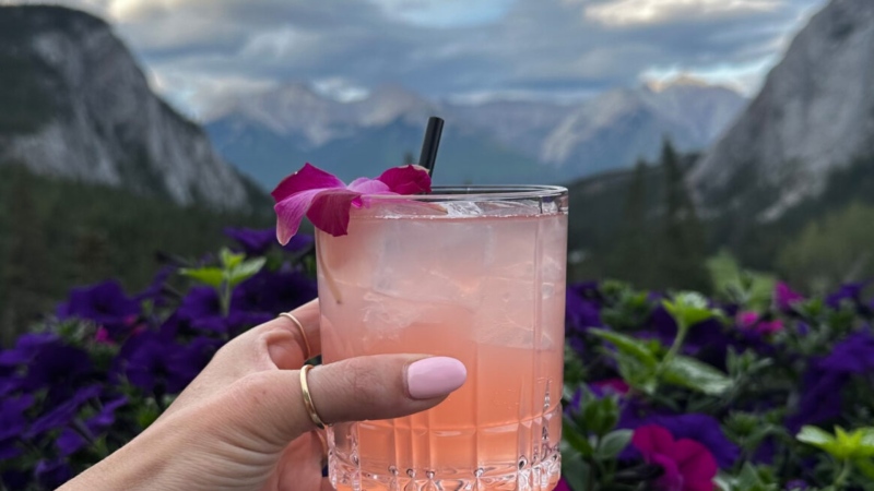 A drink is seen at the Rundle Bar patio at the Fairmont Banff Springs hotel in Banff, Alta. (Canadas100best.com/Rebecca Felgate) 