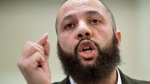 Adil Charkaoui makes a point during a news conference Friday, February 27, 2015 in Montreal. THE CANADIAN PRESS/Paul Chiasson