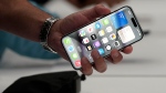 The iPhone 15 Pro is shown after its introduction on the Apple campus, Sept. 12, 2023, in Cupertino, Calif. (Jeff Chiu / AP Photo)