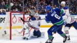 Vancouver Canucks' J.T. Miller (9) scores the winning goal against Edmonton Oilers goalie Calvin Pickard during the third period of Game 5 on May 16, 2024. (THE CANADIAN PRESS/Darryl Dyck)