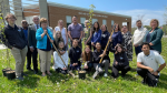 A group of staff and ECO club students planted trees at Our Lady of the Lake Catholic School May 16, 2024. (Photo: submitted)