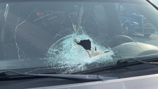 A piece of metal debris came flying through the windshield of a pickup truck on Highway 403 on Friday morning. (OPP/ X) 