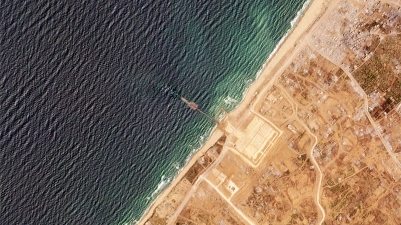 This satellite image from Planet Labs PBC shows a pier installed by the U.S. military in the Gaza Strip on Thursday, May 16, 2024. (Planet Labs PBC via AP)