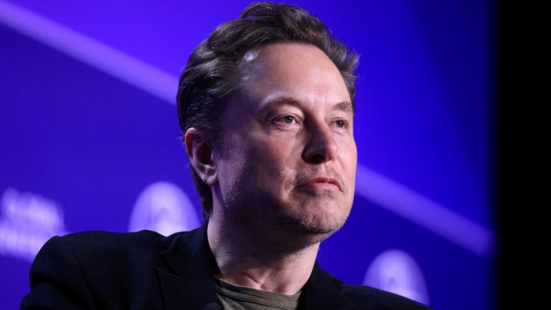 Elon Musk's brain implant startup Neuralink is accepting applications for a second human trial participant. Musk is seen here on May 6 in Beverly Hills. (David Swanson / Reuters via CNN Newsource)