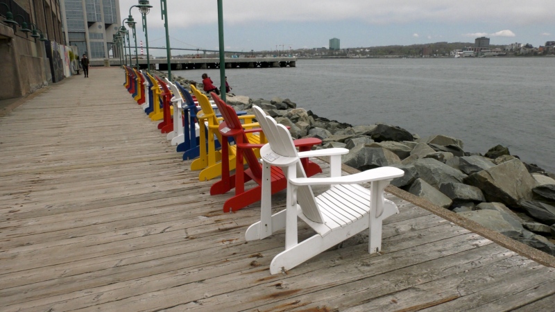 Chairs on the Halifax Waterfront offer a close-up view to the Halifax Harbour. (CTV/Stephanie Tsicos)