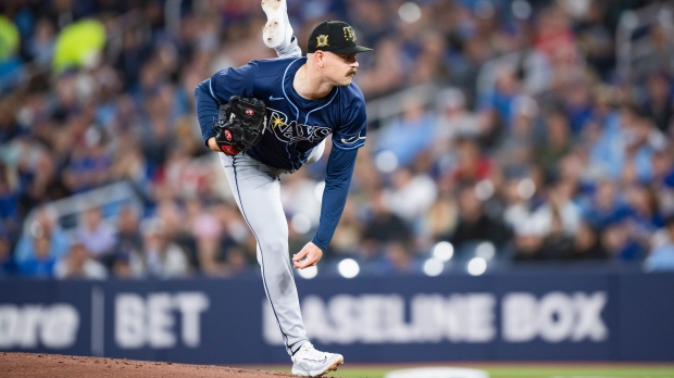 Tampa Bay Rays starting pitcher Tyler Alexander (14) throws the ball during first inning MLB baseball action against the Toronto Blue Jays in Toronto, Friday, May 17, 2024. THE CANADIAN PRESS/Chris Katsarov 