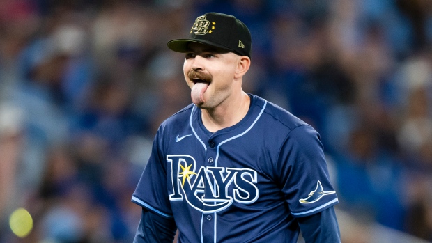 Tampa Bay Rays pitcher Tyler Alexander (14) reacts while walking back to the dugout after the seventh inning of MLB baseball action against the Toronto Blue Jays in Toronto, Friday, May 17, 2024. THE CANADIAN PRESS/Chris Katsarov