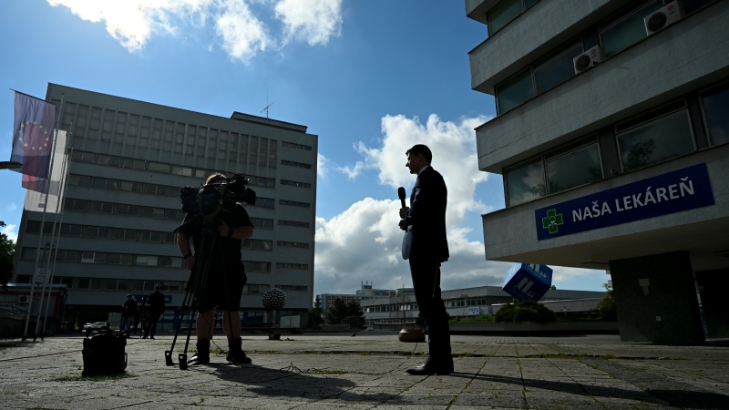Members of the media film outside the F. D. Roosevelt University Hospital, where Slovak Prime Minister Robert Fico, who was shot and injured, is being treated, in Banska Bystrica, central Slovakia, Saturday, May 18, 2024. (AP Photo/Denes Erdos)