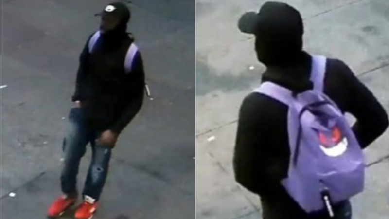 Toronto police are searching for a man who slashed another man at Yonge and Dundas streets on May 18, 2024.