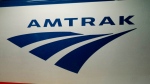 The Amtrak logo is seen on a train at 30th Street Station in Philadelphia, Feb. 6, 2014. (Matt Rourke, The Associated Press)