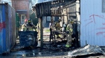 Firefighters battle fire at building at Essa Road and Tiffin Street, in Barrie, Ont on May 18, 2024 (CTV News/ Milke Lang). 
