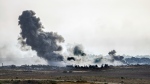 Smoke rises following an Israeli airstrike in the Gaza Strip, as seen from southern Israel, Friday, May 17, 2024. THE CANADIAN PRESS/AP-Tsafrir Abayov

