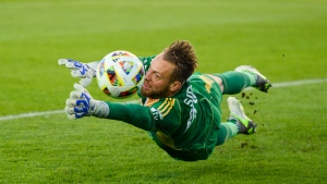 CF Montreal goalkeeper Jonathan Sirois (40) attempts to make a save during first half MLS soccer action against Toronto FC in Toronto, Saturday, May 18, 2024. (Chris Katsarov, The Canadian Press)