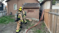 Fire crews responding to a house fire on the 1700 block of Winnipeg Street on May 18, 2024. (Source: Regina fire)