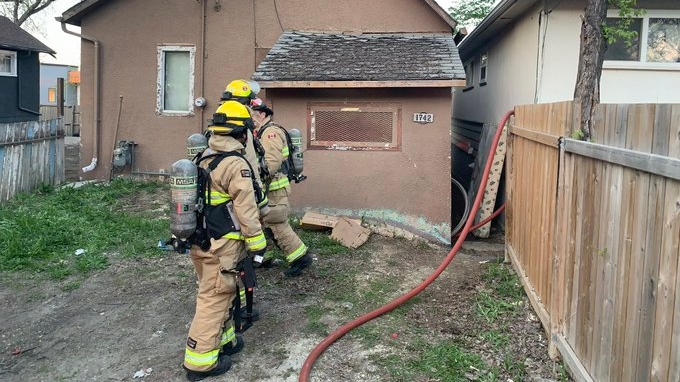 Fire crews responding to a house fire on the 1700 block of Winnipeg Street on May 18, 2024. (Source: Regina fire)