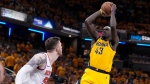 Indiana Pacers forward Pascal Siakam (43) shoots over New York Knicks center Isaiah Hartenstein on May 17, 2024. (Michael Conroy/AP Photo)