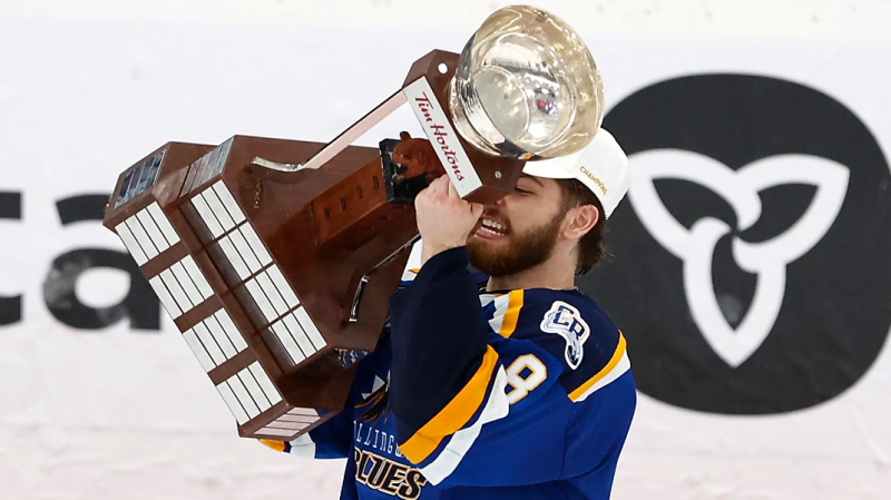 Collingwood Blues player holds the centennial cup in Oakville, Ont on May 19, 2024 (Courtesy: OJHL).