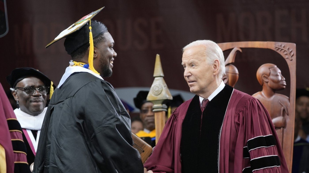 Biden shakes hands with Morehouse graduate