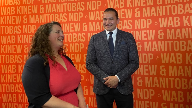 NDP Tuxedo byelection candidate Carla Compton stands with Premier Wab Kinew on May 20, 2024. (Alexandra Holyk/CTV News Winnipeg)