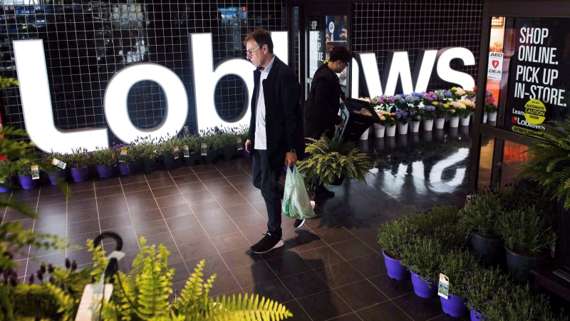 A man walks out through the entrance of a Loblaws store in Toronto on Thursday, May 3, 2018. THE CANADIAN PRESS/Nathan Denette