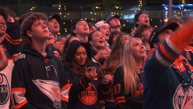 Oilers fans celebrate the team making the western conference final on May 20, 2024. 