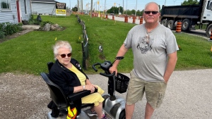 Marjorie Nowlan and her son Bill are seen in front of their home on South Edgeware Road near the intersection with Highbury Avenue on May 21, 2024. (Sean Irvine/CTV News London)