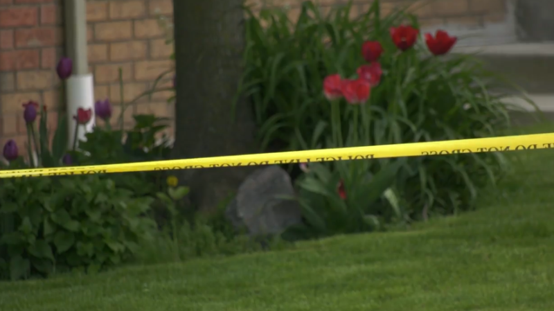 Yellow police tape surrounds a home in Bradford West Gwillimbury, Ont., as a suspected murder-suicide is under investigation. (CTV News Barrie)