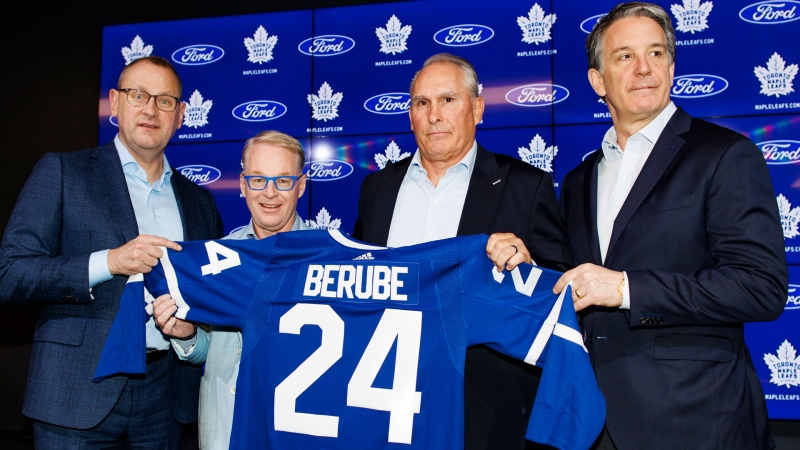 Toronto Maple Leafs GM Brad Treliving, left to right, Maple Leafs Sports and Entertainment CEO Keith Pelley, Toronto Maple Leafs new head coach Craig Berube and Toronto Maple Leafs president Brendan Shanahan pose for a photo after Berube’s introductory press conference in Toronto, Tuesday, May 21, 2024. THE CANADIAN PRESS/Cole Burston