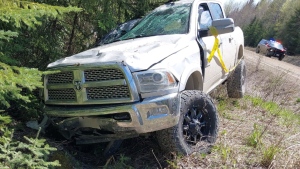 A driver involved in a rollover single-vehicle collision near Kapuskasing has been charged with impaired driving, dangerous driving and failing to remain. (OPP photo)
