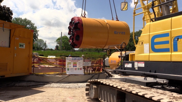 A micro tunneling machine will be lowered into this hole as they will drill across Wharncliffe Road in London, Ont. (Brent Lale/CTV News London)
