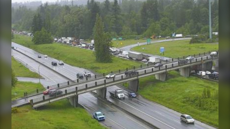 Traffic on Highway 1 westbound near 232 Street in Langley is seen after an overpass strike farther up the road on Tuesday, May 21, 2024. (DriveBC)