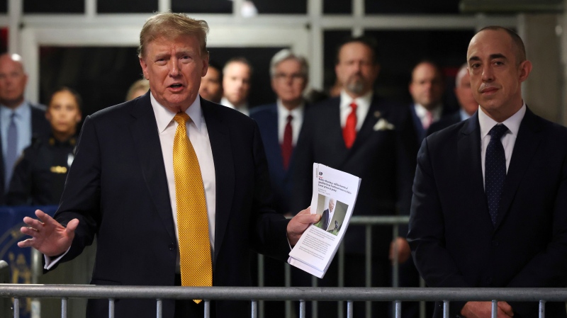 Former President Donald Trump speaks to reporters at Manhattan Criminal Court on Tuesday, May 21, 2024 in New York. (Michael M. Santiago/Pool Photo via AP)