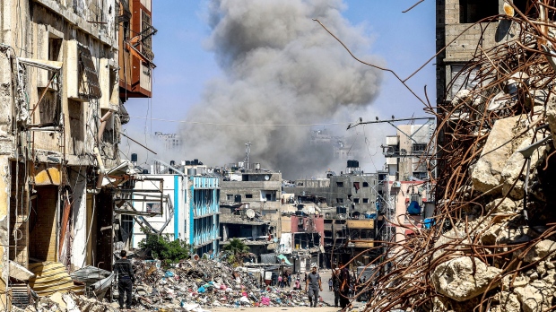 Smoke rises during Israeli bombardment in Jabalia in the northern Gaza Strip on May 14 amid the ongoing conflict in the Palestinian territory between Israel and Hamas. (AFP / Getty Images)