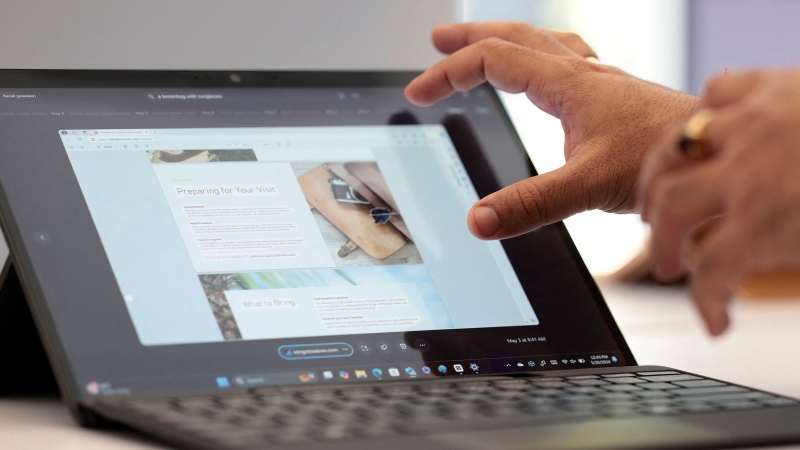 A demonstration of Microsoft's Recall feature on a Surface Pro is pictured following the Microsoft Briefing event in Redmond, Washington on May 20, 2024. (Jason Redmond / AFP)