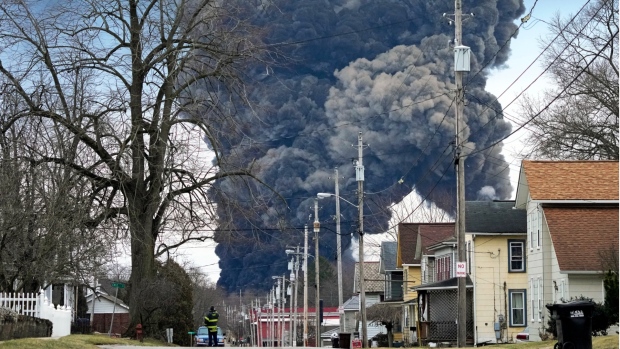 A black plume rises over East Palestine, Ohio, as a result of the controlled detonation of a portion of the derailed Norfolk Southern trains Monday, Feb. 6, 2023. (AP Photo/Gene J. Puskar, File)