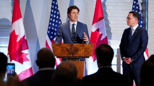 Prime Minister Justin Trudeau delivers a speech as he is joined on stage by Pennsylvania Governor Josh Shapiro during a reception hosted by the Consul General of Canada in New York, Tom Clark in Philadelphia, Pa., on Tuesday, May 21, 2024. (Sean Kilpatrick / The Canadian Press)