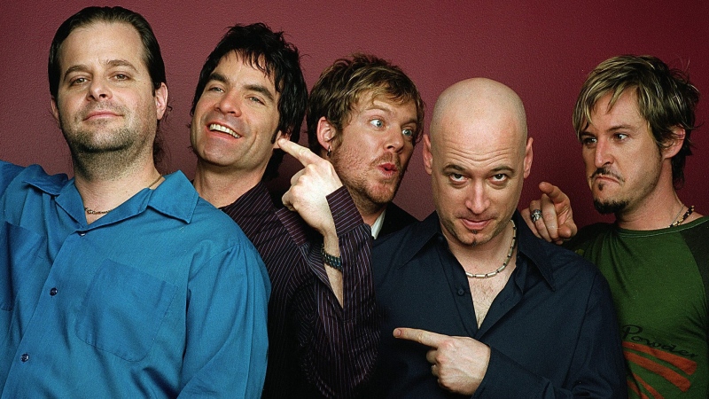 Members of the rock group Train, Rob Hotchkiss, left, Patrick Monahan, Scott Underwood, Jimmy Stafford and Charlie Colin pose in New York, Feb. 15, 2002. (AP Photo/Jim Cooper)