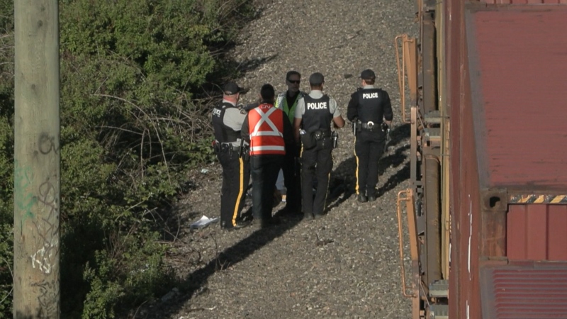 Police are pictured at the scene of a fatal train collision in Langley on Wednesday, May 22. (CTV News) 