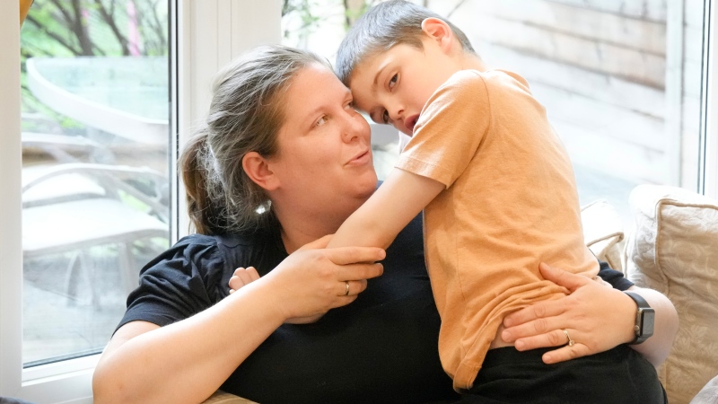 Alexis Wilson is photographed at home with her seven-year-old son Emmett, who has severe autism, in Thornhill, Ont., on Tuesday, April 30, 2024. THE CANADIAN PRESS/Chris Young
