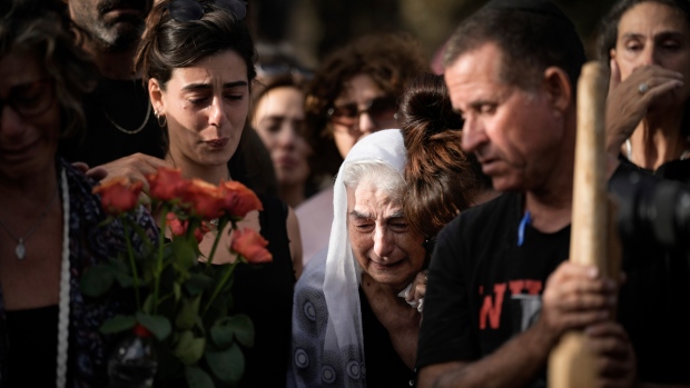 Mourners attend the funeral of Shani Louk in Srigim, Israel, on Sunday, May 19, 2024. (AP Photo/Leo Correa)