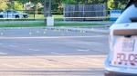 Evidence markers are pictured outside a public school on Montevideo Drive in Mississauga following a shooting Wednesday May 22, 2024. (Simon Sheehan /CP24) 